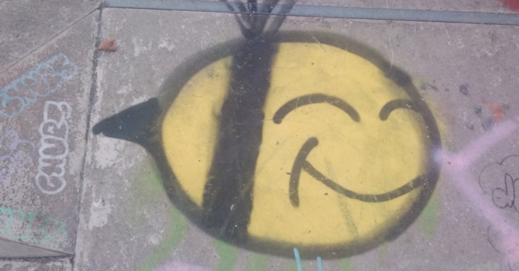 Bee, street art on the wall of skate park in North Liverpool