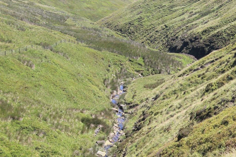 Ragged landscape on the climb up Pendle Hill.
