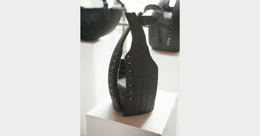 Corset Style fop on display on plinth.