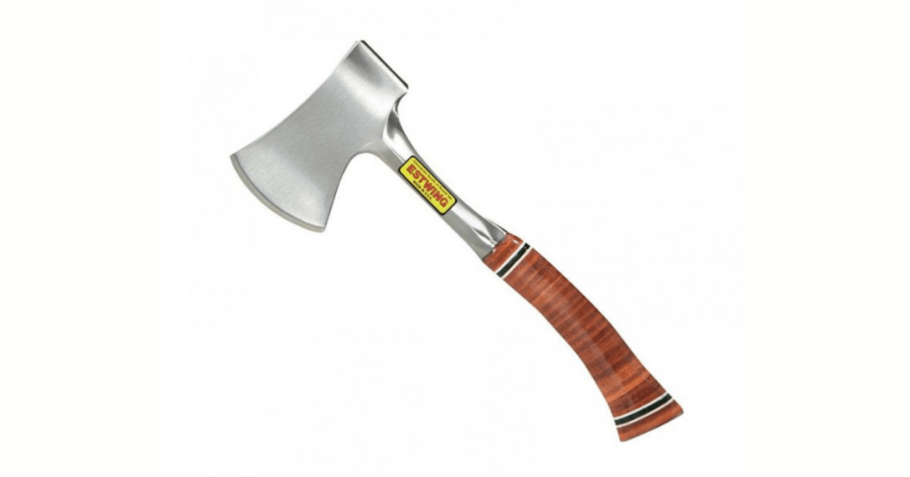 Single-bladed hatchet with a polished metal head and a handle wrapped in stacked leather rings. A yellow and red label on the metal portion displays the brand name “ESTWING.” The tool is compact and designed for chopping wood, with a durable and ergonomic build suitable for camping or survival use.