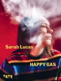 Book cover for Sarah Lucas: Happy Gas, published by Tate. This art book features a striking image of the artist in a colorful striped garment, partially obscured by smoke against a vivid red background. The surreal portrait reflects Lucas’s provocative style and themes explored in contemporary British art.