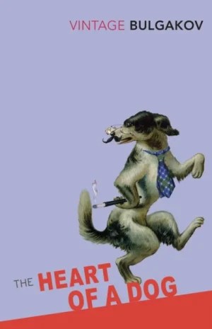 Book cover of “The Heart of a Dog” by Bulgakov, featuring a light purple background and an illustrated anthropomorphic dog standing upright with a monocle, mustache, blue checkered tie, cane, and cigarette. Title appears in bold red and grey text at the bottom; author name in red and black at the top.