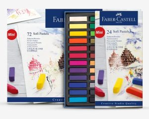 Faber-Castell Mini Soft Pastels set displayed with open tray of 24 vibrant pastel sticks in assorted colours, shown alongside the 72‑piece and 24‑piece product boxes featuring artistic illustrations. Creative Studio Quality branding visible on packaging.