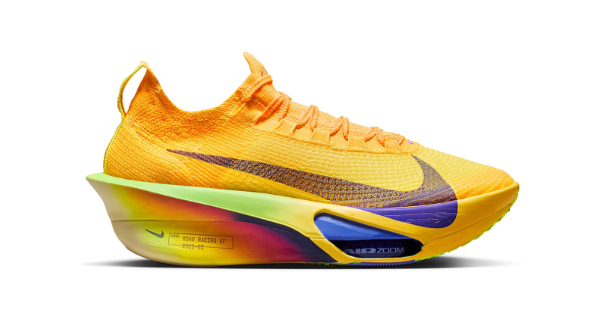 Bright orange Nike – Women’s Alphafly 3 running shoe with a breathable upper, bold purple Swoosh, and a sculpted, high‑stack midsole with a vivid yellow‑to‑purple‑to‑pink gradient, showcasing visible Air Zoom cushioning for elite road performance.